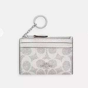 NWT $88 Coach Metallic Silver id case w/  Keychain In Signature Canvas
